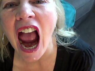 Mature blonde mouth fists and gets sperm. amateur blonde cumshot